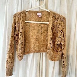Exhilaration. Sparkly gold shrug/cardigan.